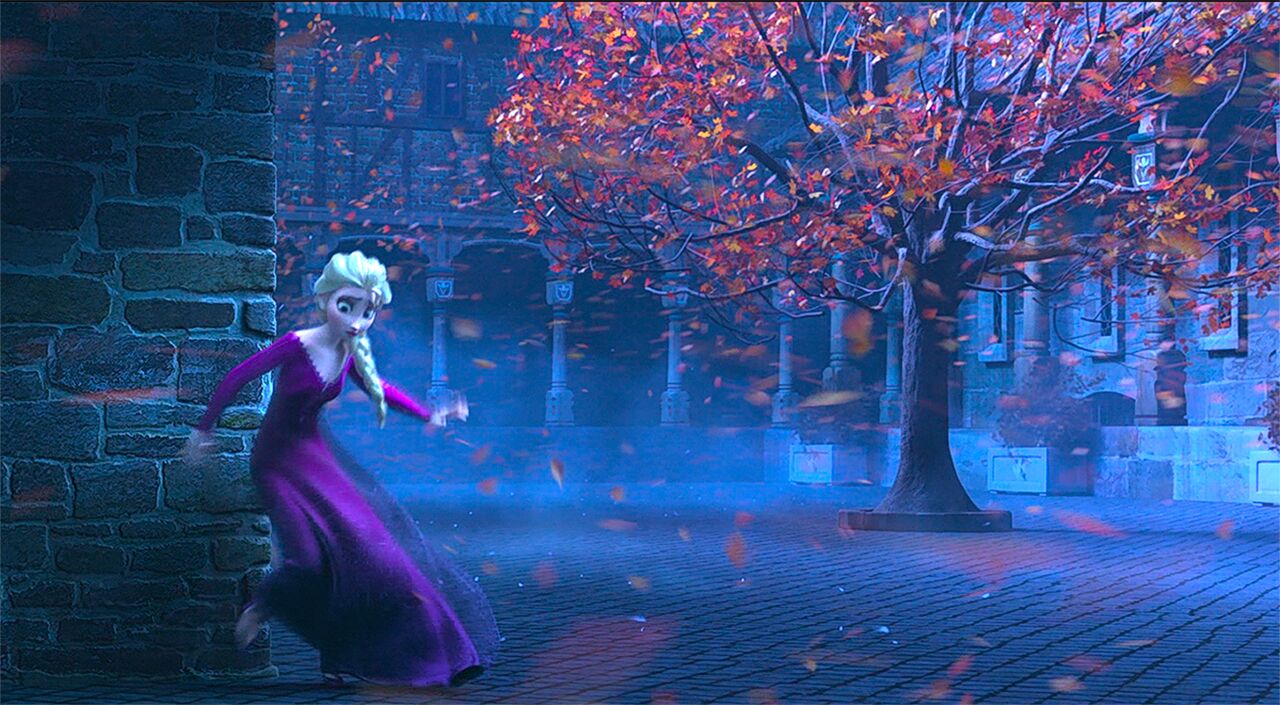 Elsa hiding behind the Arendelle castle wall